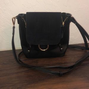 Charming Charlie Black with gold details backpack
